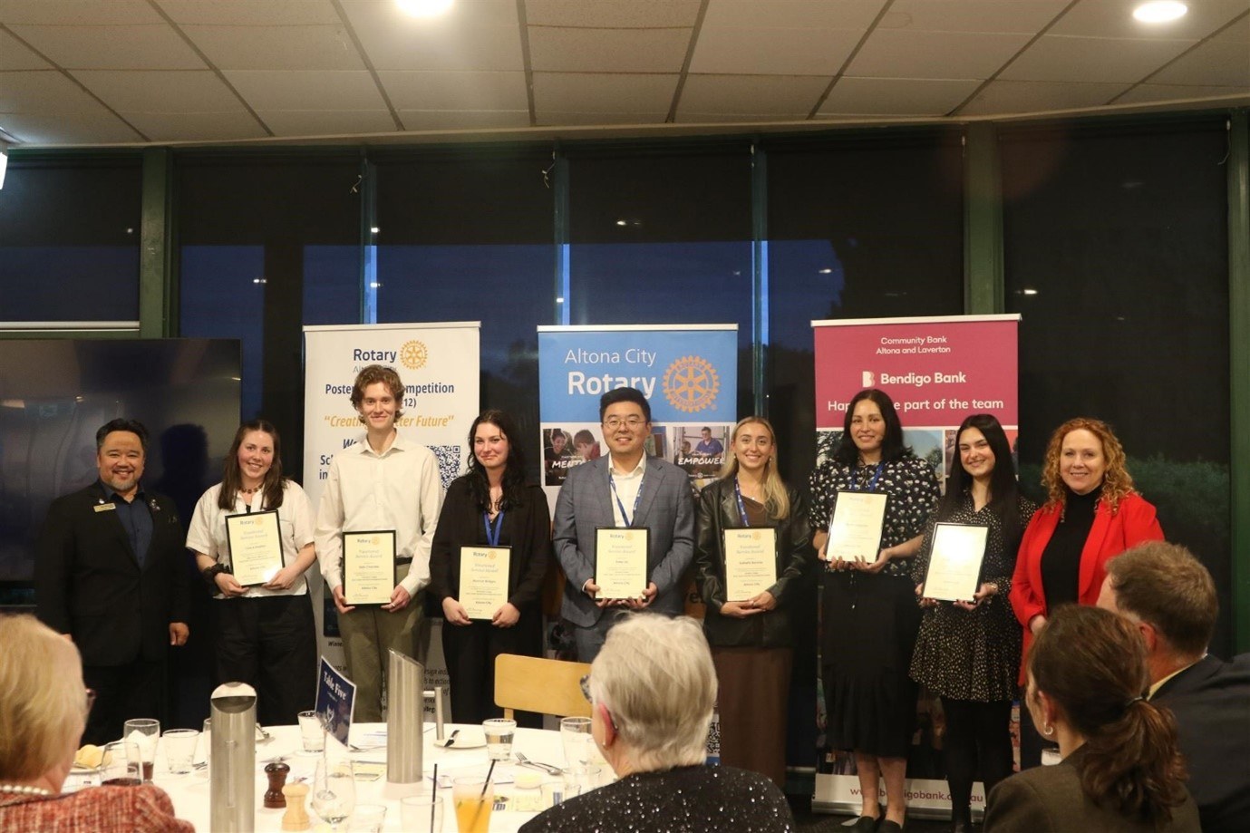 Grace, second from the left, with her award.