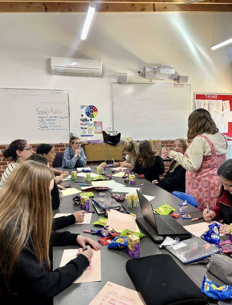 Students engaging in discussion around media influence and self image